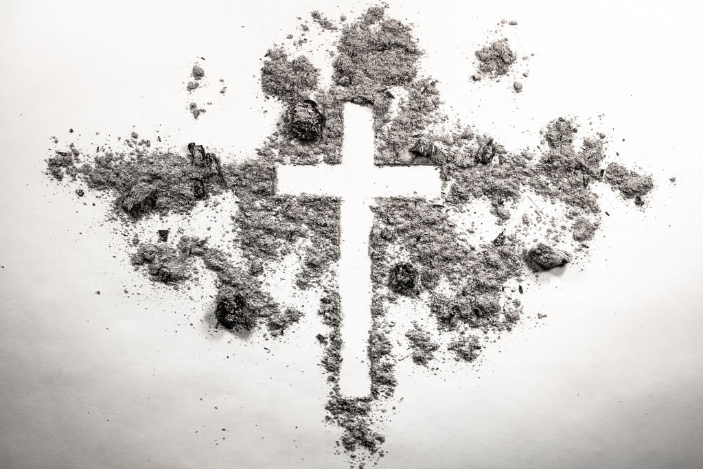Ash wednesday cross, crucifix made of ash